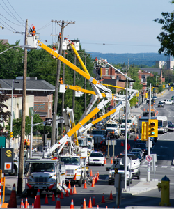 Hydro trucks repairing a series of lines